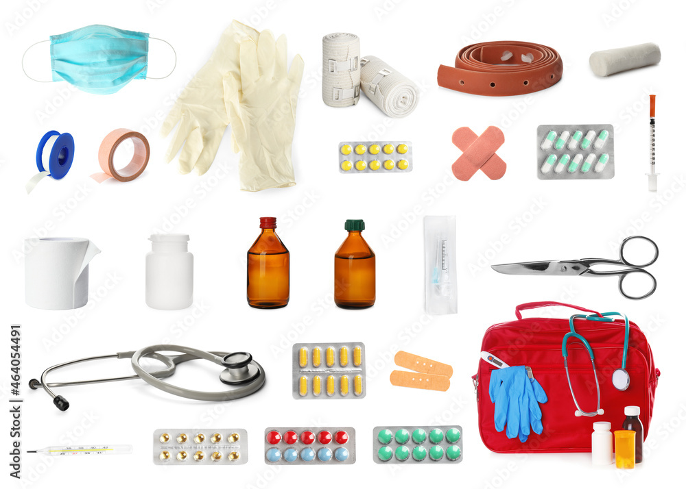 Obraz premium First aid kit. Set with different medical supplies on white background