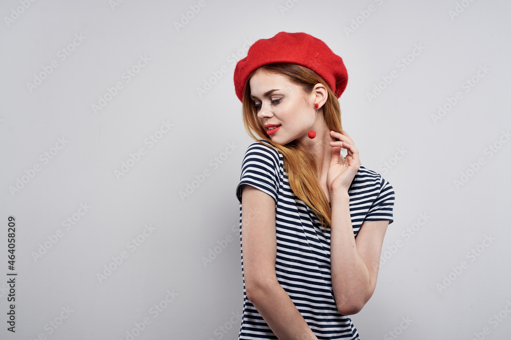 cheerful woman wearing a red hat makeup France Europe fashion posing model studio cheerful woman wearing a red hat makeup France Europe fashion posing model studio