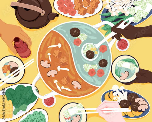 Overhead of people eating asian vegetable hotpot