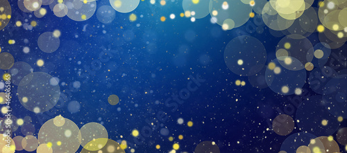 Christmas and New Years blue and gold glitter and bokeh magical holiday abstract background border with copy space