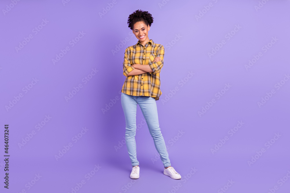 Fototapeta premium Full length photo of young attractive african girl happy positive smile crossed hands isolated over purple color background