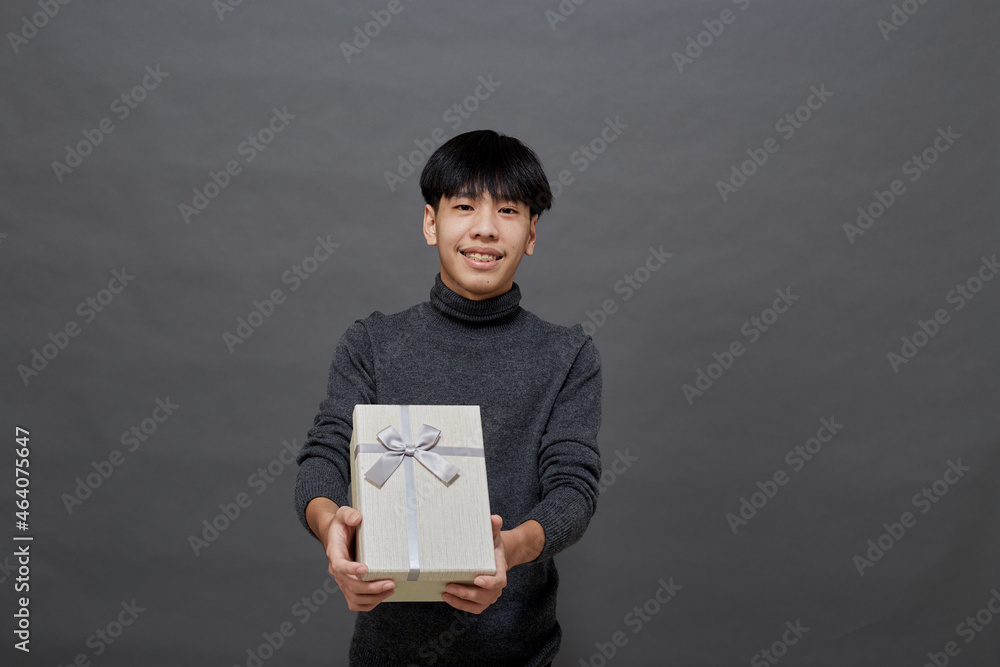 Christmas party man holding gift box