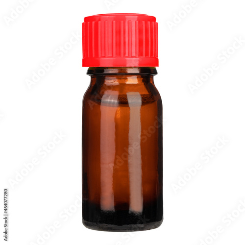 Amber color small pharma grade empty glass bottle with red cap.