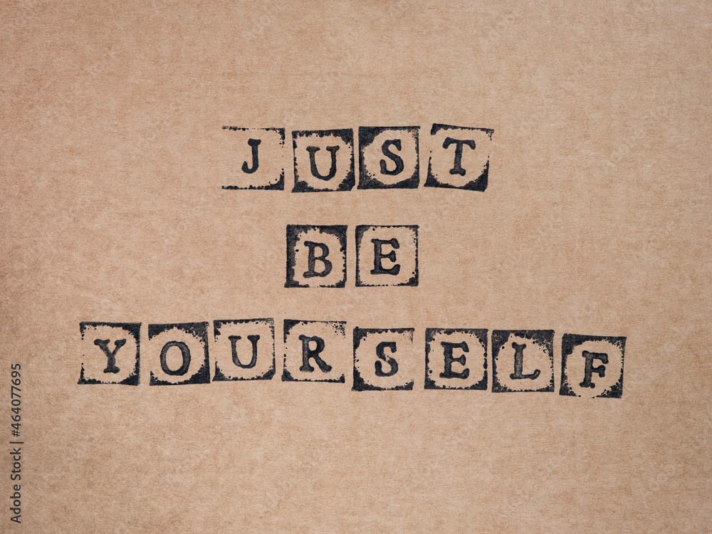 Cardboard with words Just Be Yourself Cardboard with words Just Be Yourself