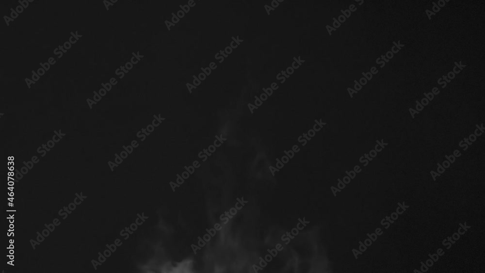 Warm Steam from a Mug of Tea. Light warm water vapor slowly rises above the tea mug and quickly disappears against a black background. Filmed 240fps Warm Steam from a Mug of Tea. Light warm water vapor slowly rises above the tea mug and quickly disappears against a black background. Filmed 240fps
