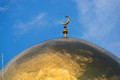 Gilded dome of the mosque against the sky