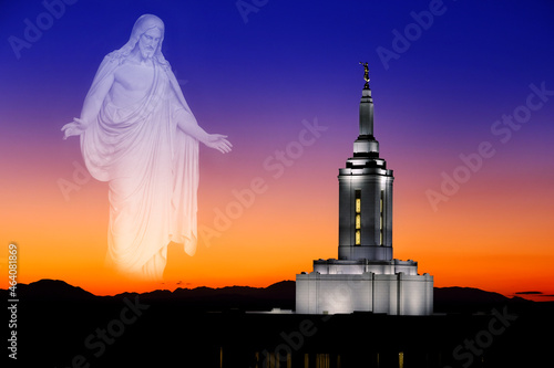 Pocatello Idaho LDS Mormon Temple with Lights at Sunset and Jesus Looking with Arms Out photo