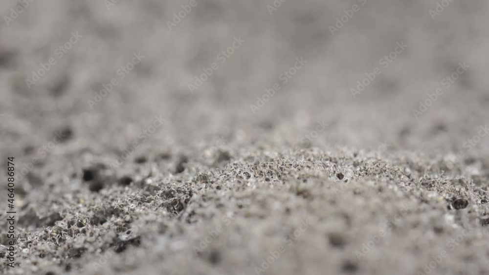 Porous black material for sound insulation, macro slide shot. Porous black material for sound insulation, macro slide shot.