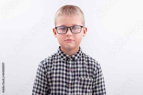 Portrait of a boy with broken glasses © dimasobko