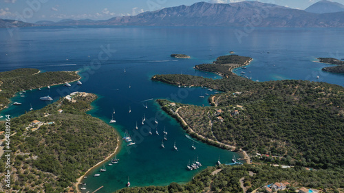 Aerial drone photo of safe anchorage of fjord bays in Meganisi island with crystal clear calm sea, Meganisi island, Ionian, Greece