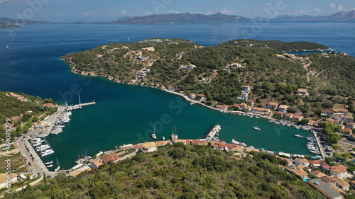 Aerial drone photo of fjord bay and port of Vathi a natural sail boat anchorage in island of Meganisi, Ionian, Greece photo