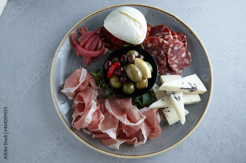 Antipasto platter on plate photo