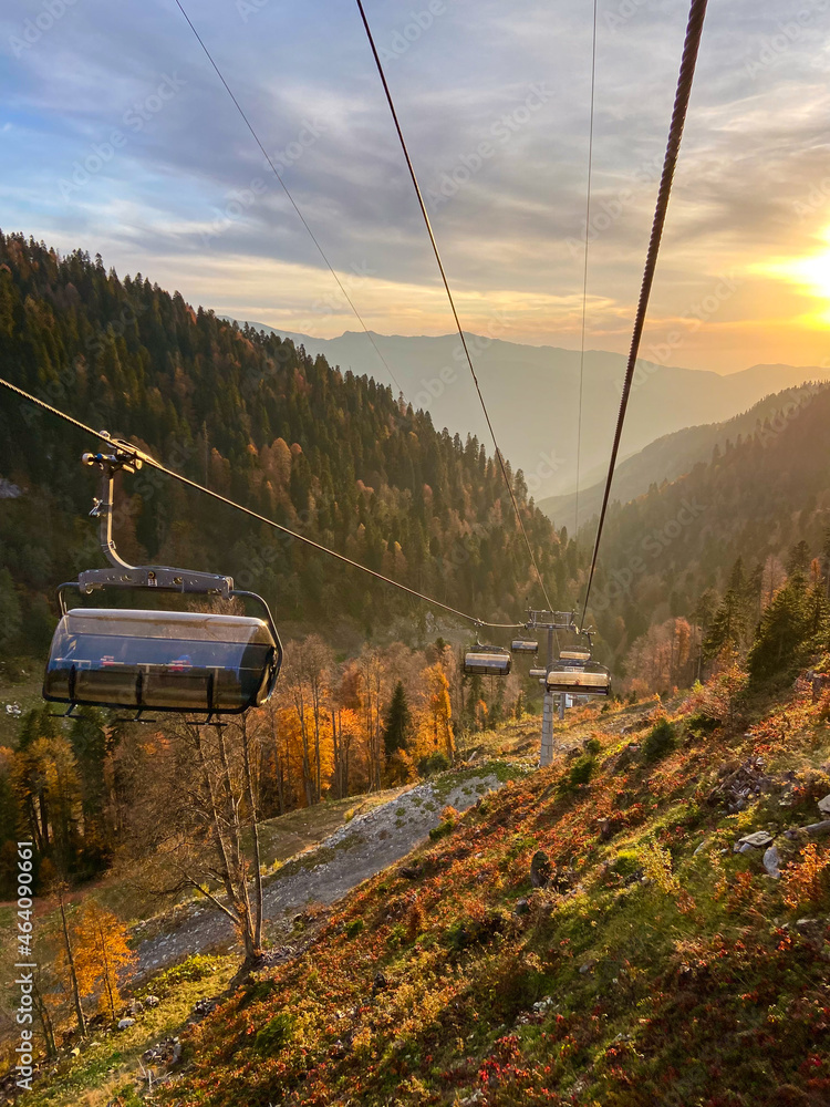 gorgeous view of the autumn slopes of the mountains of the Caucasian ridge at sunset