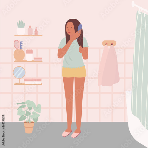 A young woman stands and combs her hair. A pretty female in the bathroom. Flat vector illustration.