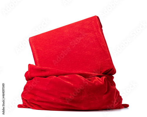 Santa Claus red bag with gift box packed in red cloth, isolated on white background. File contains a path to isolation.