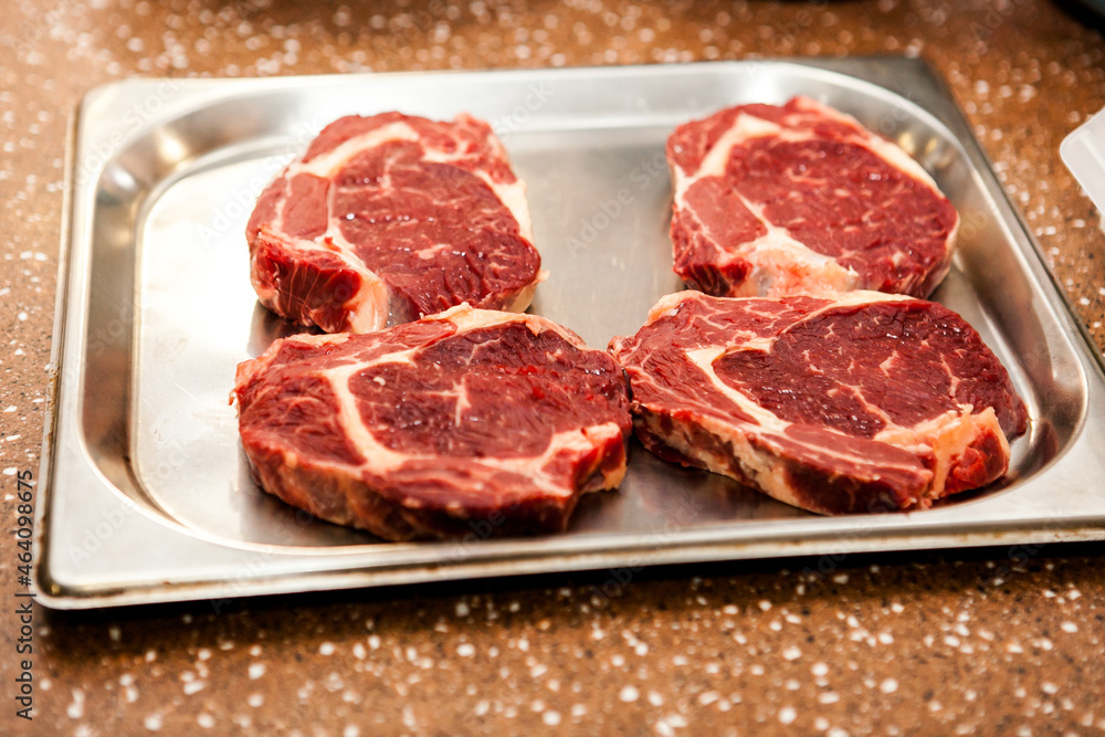 delicious fresh red meat steaks, prepared for cooking delicious fresh red meat steaks, prepared for cooking