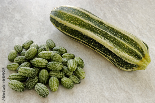 Cucamelon and zucchini vegetable on a table. photo