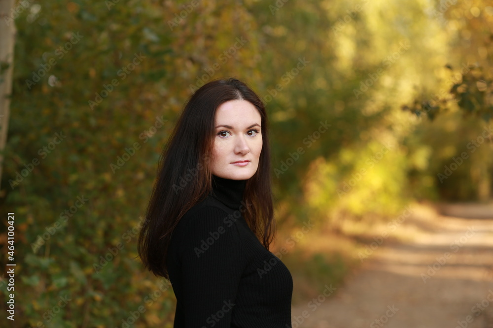 Long haired brunette in the forest Long haired brunette in the forest