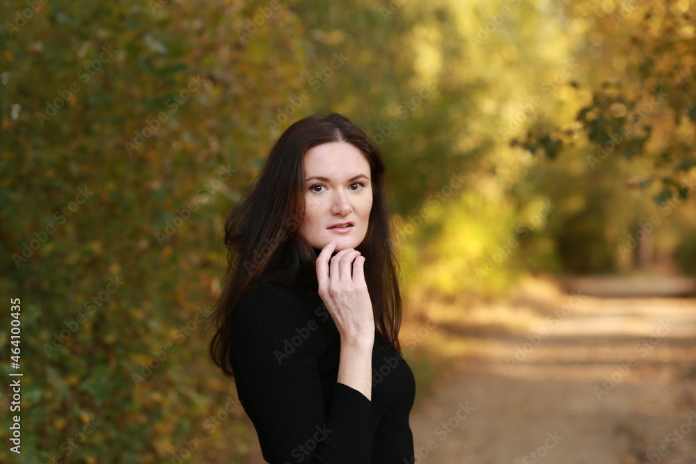 Long haired brunette in the forest Long haired brunette in the forest