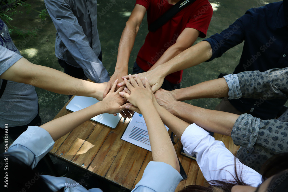 Hand team of cooperation in the construction business.To succeed in developing sustainable partnerships.concept Hand team of cooperation in the construction business.To succeed in developing sustainable partnerships.concept