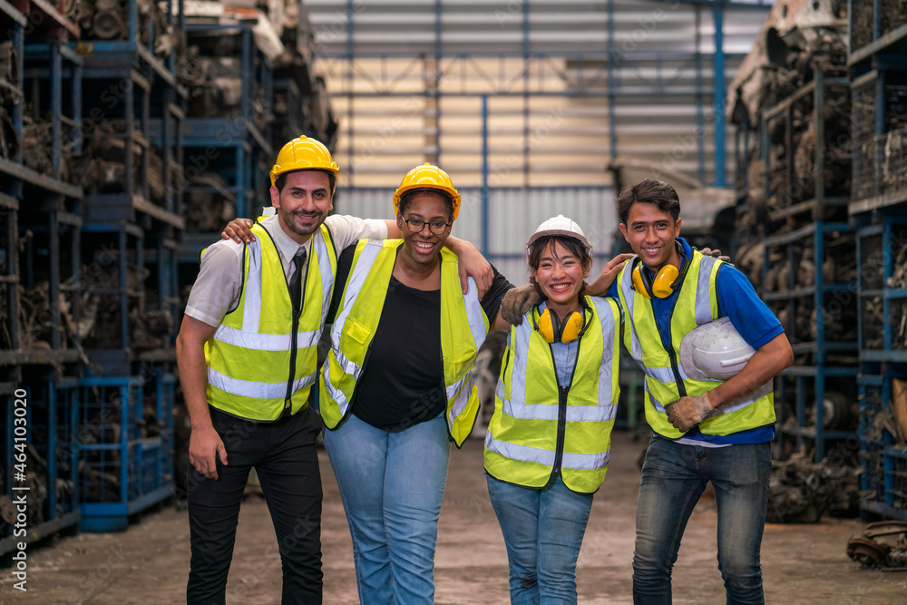 Group of employees and engineers in industrial plants. Team of workers and engineer celebrating in parts warehouse. Group of employees and engineers in industrial plants. Team of workers and engineer celebrating in parts warehouse.