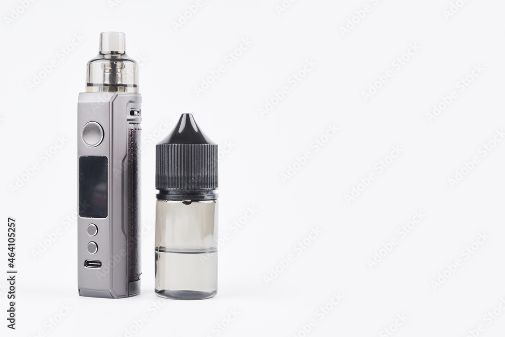 Vape and vape juice isolated on white background with copy space, electronic cigarette, alternative smoking concept Vape and vape juice isolated on white background with copy space, electronic cigarette, alternative smoking concept
