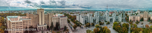 Autumn colorful city aerial panorama view from Freedom Svobody Square on Derzhprom and Karazin National University buildings with epic cloudscape in Kharkiv, Ukraine