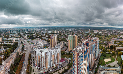 Multistory modern high buildings cityscape aerial view. Kharkiv city Pavlovo Pole district panorama  Nauky ave with epic dark clouds