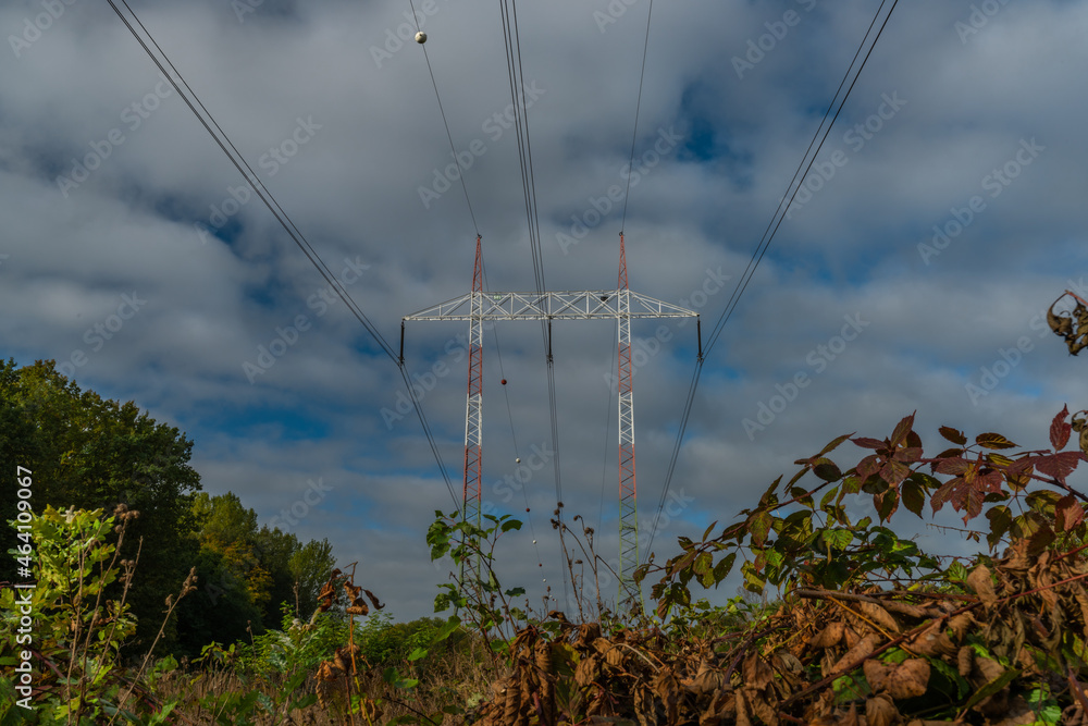 High voltage electric line in autumn color blue sky day