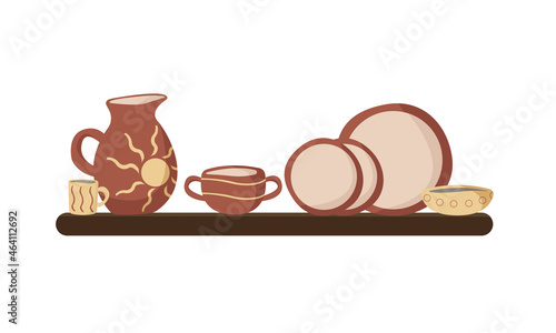 Red and yellow ceramic kitchenware on the shelf. Minimalism style