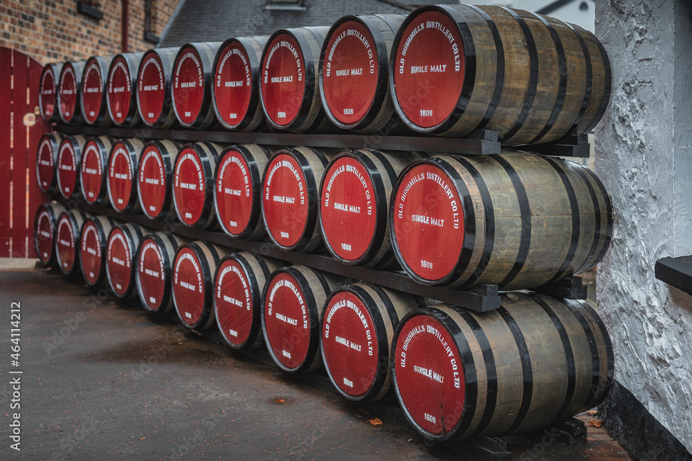 Bushmills, Northern Ireland, Aug 2019 Rows of large wooden barrels with