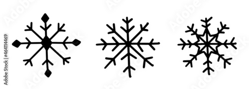 Set of three different hand draw snowflake icons. Vector illustration isolated on background.