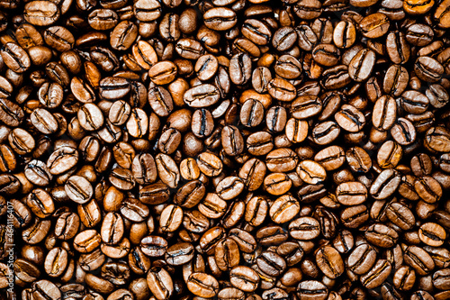 Roasted coffee or espresso beans background. Colorful table top view. © Marcus Friedrich