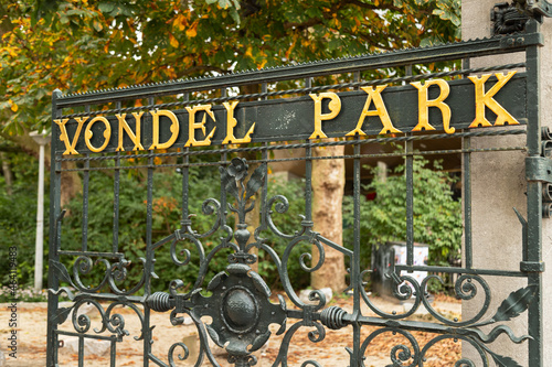 Photography Golden letters on the gate at the entrance to the Vondelpark, near the Leidseplein in Amsterdam, the Netherlands