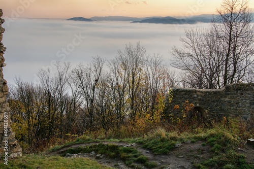 View of the fog over Novy Jicin. Castle ruins Stary Jicin. Czechia. Europe.