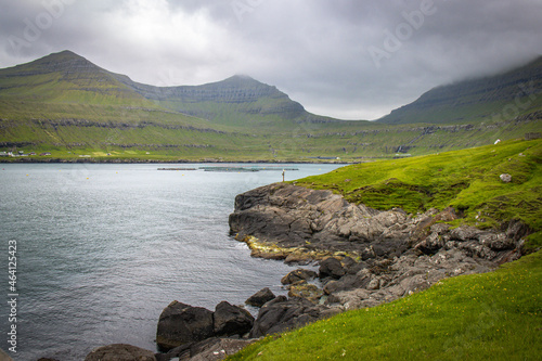 foggy weather on faroe islands, fjord, eysturoy island, north atlantic, europe