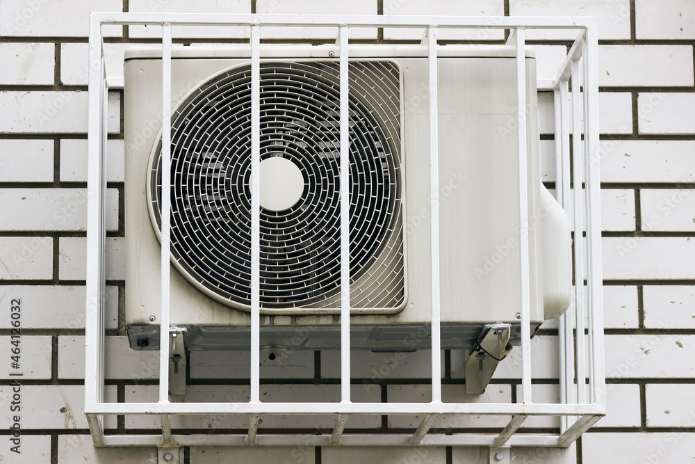 Split air conditioning system on a brick wall. Air cooling system. Split system. Split air conditioning system on a brick wall. Air cooling system. Split system.