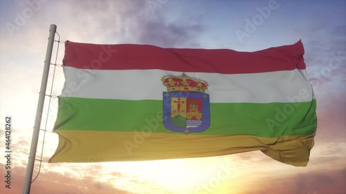 La Rioja flag, Spain, waving in the wind, sky and sun background photo
