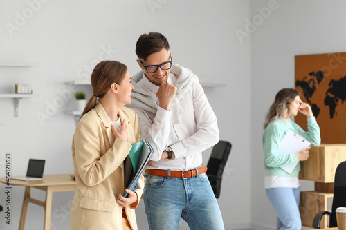 Workers gossiping about the...