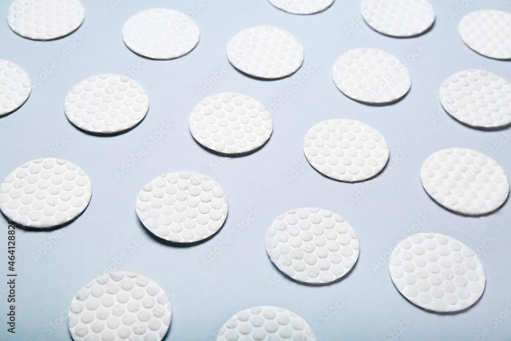 Clean cotton pads on color background Clean cotton pads on color background