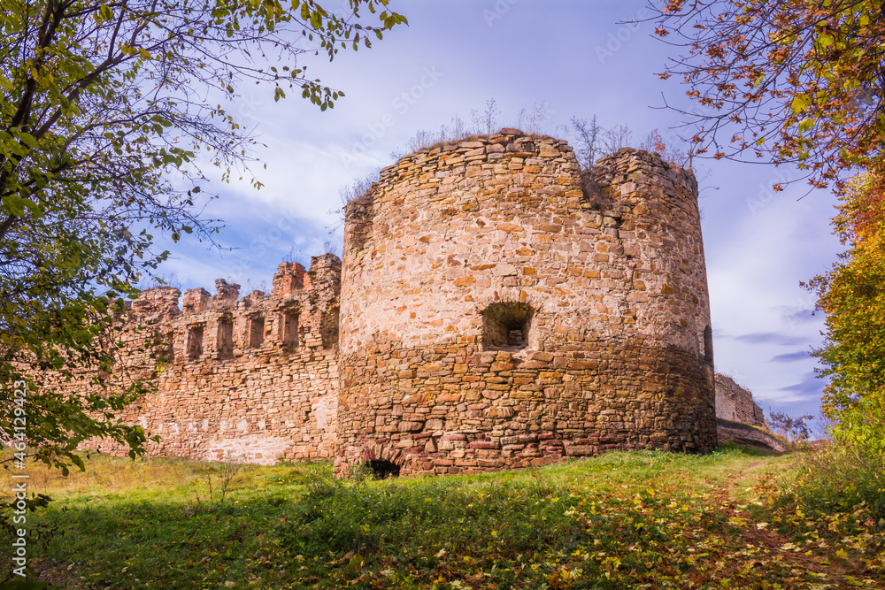 Tower and wall of an ancient castle. Ruins of the castle in Mykulyntsi, Ternopil region, Ukraine