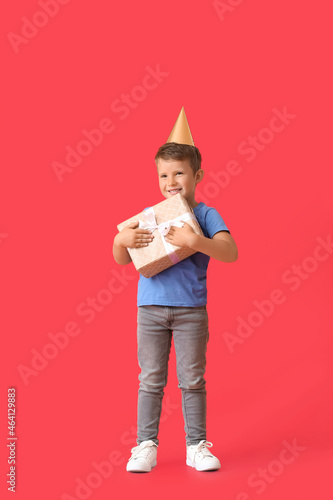 Cute little boy in party ha...
