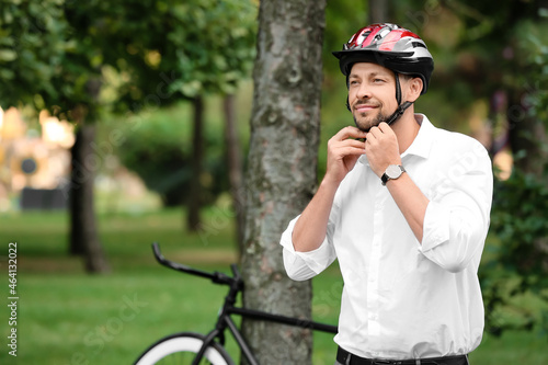 Man with bicycle helmet in ...