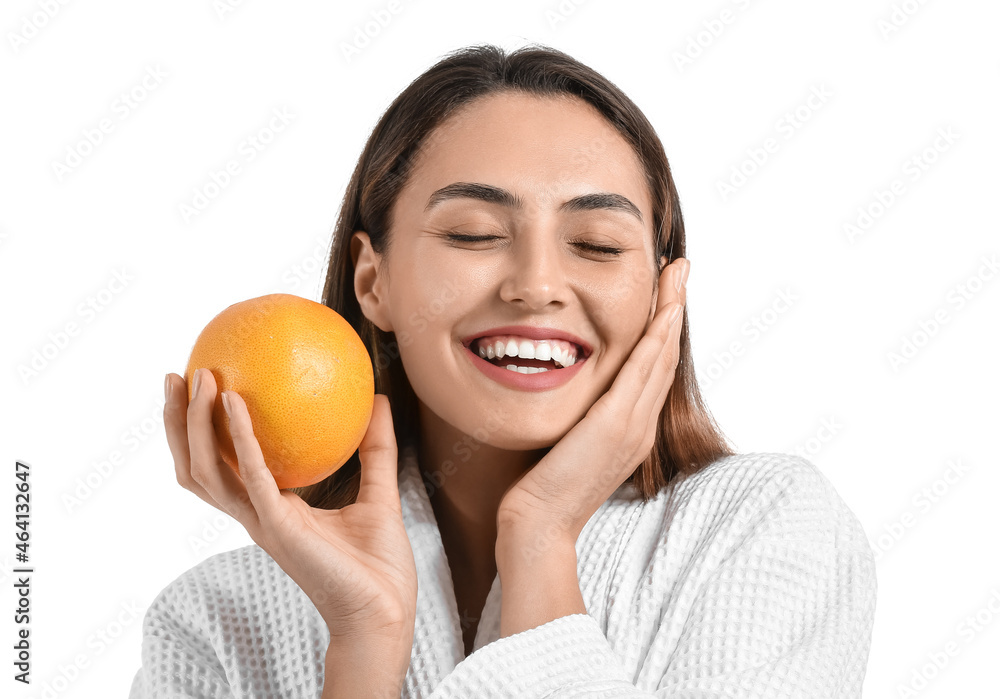 Beautiful young woman with fresh grapefruit on white background Beautiful young woman with fresh grapefruit on white background