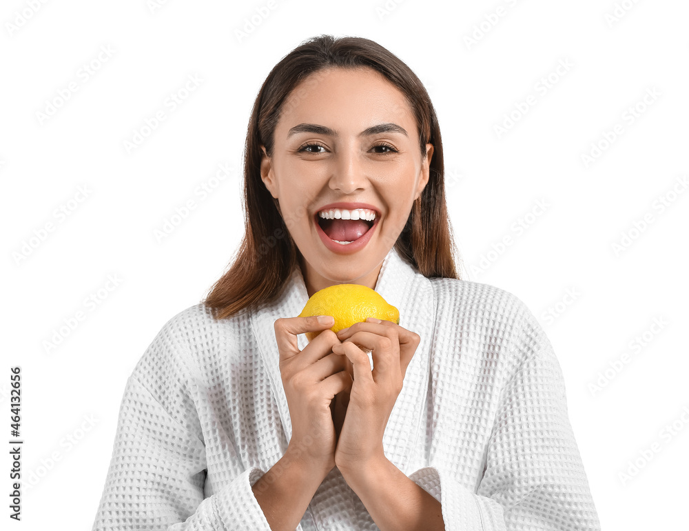 Beautiful young woman with fresh lemon on white background Beautiful young woman with fresh lemon on white background