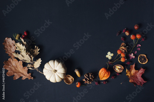 Autumn or thanksgiving composition with leaves, pumpkin,nuts and corns