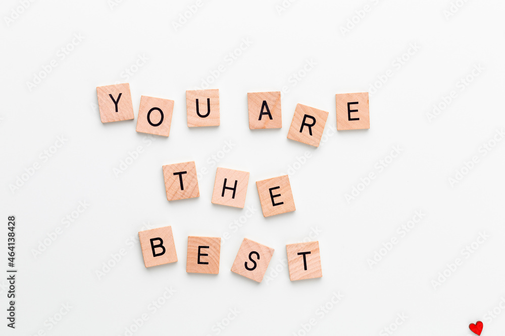 Wooden blocks in a pastel board with the text. Wooden blocks in a pastel board with the text.