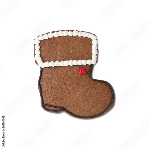 Fototapeta Naklejka Na Ścianę i Meble -  Boot shaped traditional christmas gingerbread cookie isolated over white background