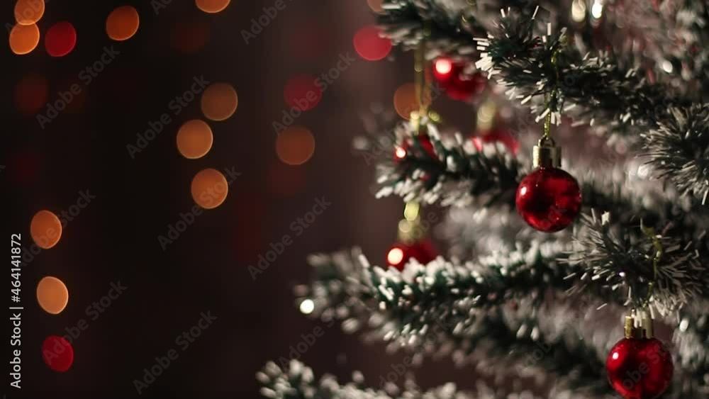 Christmas tree rotating with Christmas baubles and Christmas lights flashing in the background. Christmas tree rotating with Christmas baubles and Christmas lights flashing in the background.
