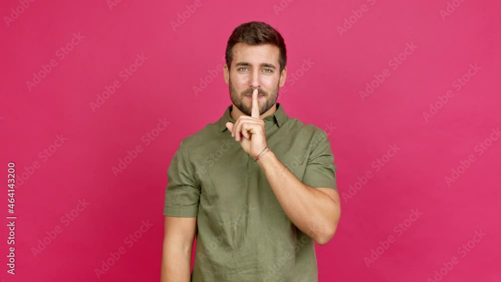 Handsome man doing silence gesture over isolated background Handsome man doing silence gesture over isolated background